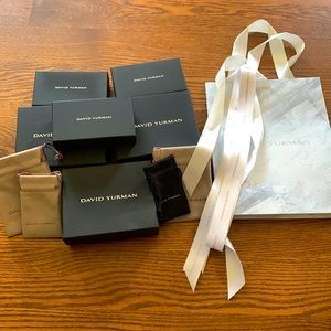 6 David Yurman Boxes, 4 David Yurman jewelry pouches, 1 DY Bag and DY ribbon
